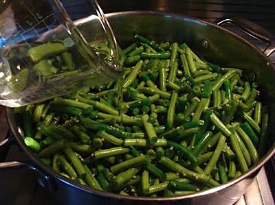 pouring water on beans
