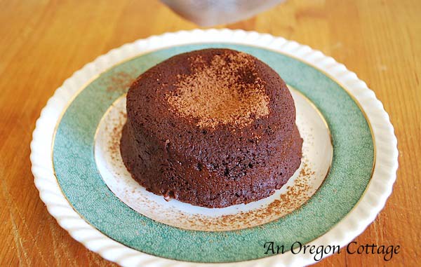 dusting lava cake with cocoa