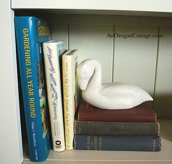 duck on books painted thrift store animals
