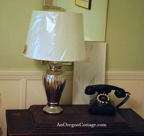 silver-lamp-on-nightstand silver-lamp-on-nightstand